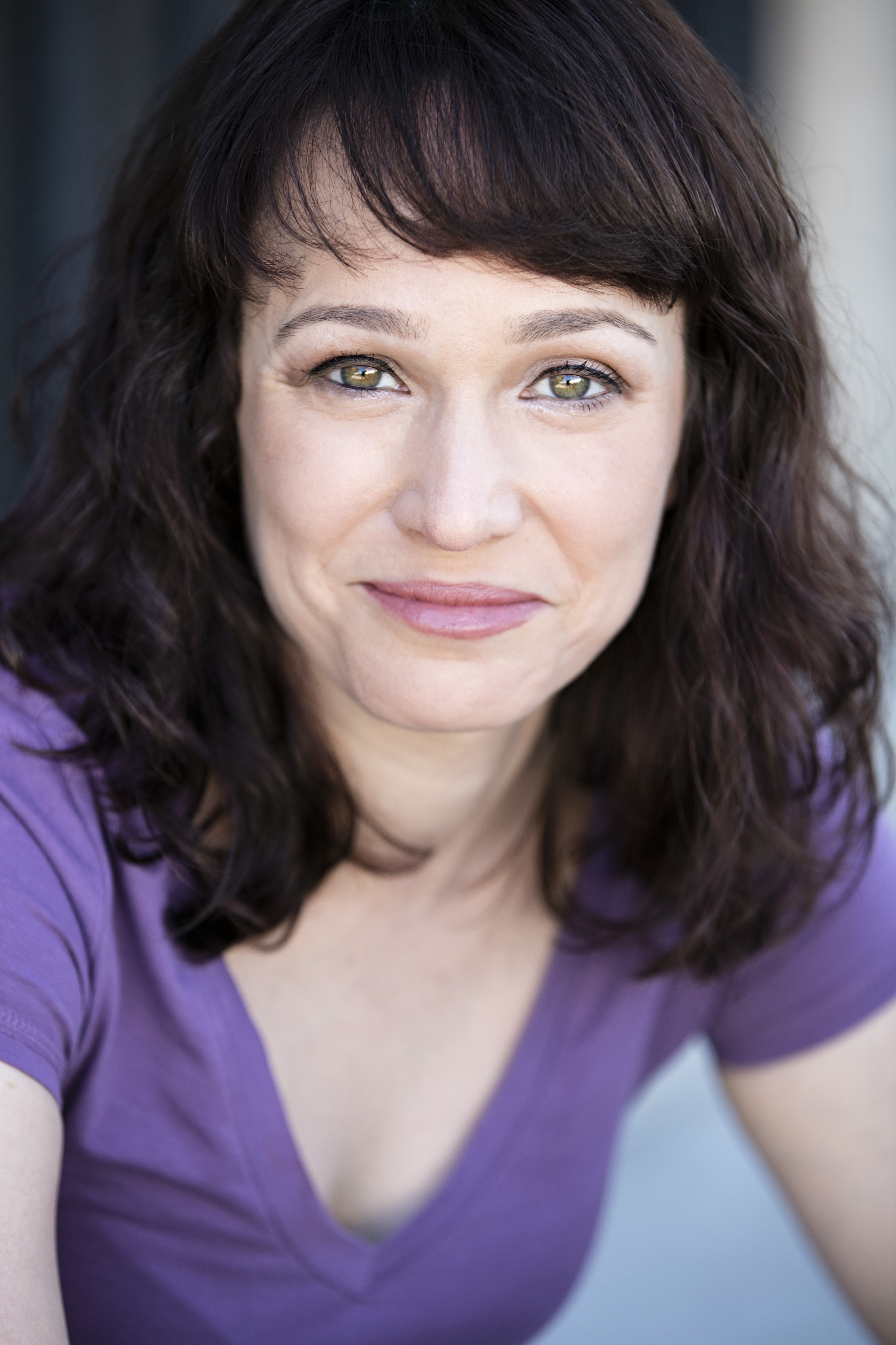 Terry%20Kaye_actor%20headshot_purple%20smirk